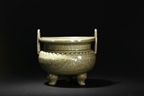 A YAOZHOU CELADON 'FLOWERS' TRIPOD CENSER
