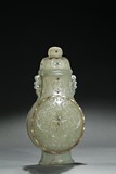 A MUGHAL-STYLE GREENISH WHITE JADE VASE