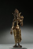 A LARGE GILT-BRONZE FIGURE OF STANDING BODHISATTVA