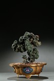 A JADE SCHOLAR'S ROCK W/ GILT-BRONZE STAND