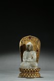 A WHITE JADE GILT-PAINTED BUDDHA W/ GILT-BRONZE BACKSPLAT
