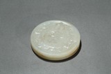 A WHITE JADE CIRCULAR 'ARCHAISTIC' PASTE BOX