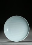 A WHITE GLAZED ANHUA-DECORATED DISH