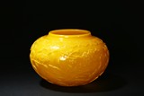 AN EGG-YOLK YELLOW GLASS FLOWERS JAR