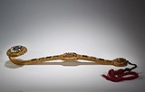 A GILT-BRONZE GEMS MOTHER-OF-PEARL INLAID RUYI SCEPTER