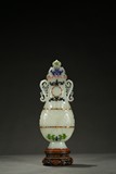 A WHITE JADE GEMS-INLAID VASE 