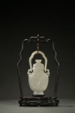 A WHITE JADE ARCHAISTIC HANGING VESSEL