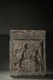 A STONE 'BUDDHIST AND ATTENDANTS' PANEL