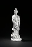 A DEHUA WHITE GLAZE STANDING 'GUANYIN' FIGURE