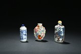 A SET OF THREE CERAMIC SNUFF BOTTLES