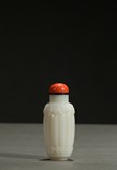 A WHITE JADE MELON-SHAPED SNUFF BOTTLE