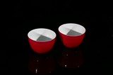 A PAIR OF RUBY-RED GLAZED CUPS