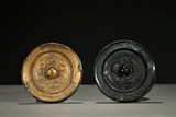 A GROUP OF TWO BRONZE MIRRORS
