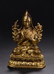 A GILT-BRONZE FIGURE OF TSONGKHAPA