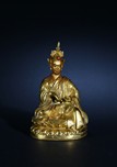 A GILT-BRONZE FIGURE OF PADMASAMBHAVA