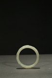 A WHITE JADE 'CHILONG' BANGLE