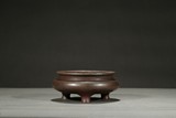 A BRONZE COMPRESSED TRIPOD CENSER