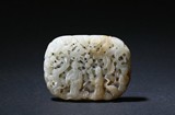 A CELADON WHITE JADE 'IMMORTAL' OPENWORK PLAQUE