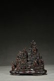 AN AGARWOOD CARVING OF MOUNTAIN LANDSCAPE