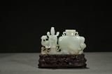 A WHITE JADE 'FIGURE AND PHOENIX' VASE GROUP