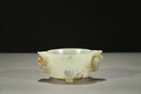 A WHITE JADE 'INSCRIPTION' TRIPOD CENSER