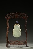 A JADE CARVED 'DAJI' DOUBLE GOURD HANGING PENDANT