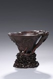 AN AGARWOOD 'PLUM' LIBATION CUP