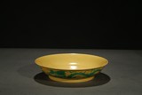 A YELLOW GROUND GREEN 'DRAGON' DISH