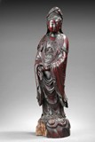 A ROSEWOOD CARVED FIGURE OF GUANYIN