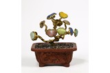 A CINNABAR LACQUER GILT-BRONZE GEMS INLAID PLANTER