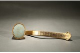 A GILT-BRONZE WHITE JADE 'SHOU' RUYI SCEPTER