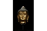A LARGE GILT-BRONZE HEAD OF BODHISATTVA 