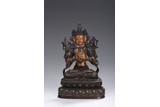 A BRONZE GILDED FIGURE OF MANJUSRI