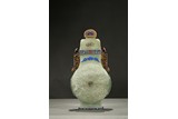 A WHITE JADE AND GILT ENAMELLED VASE 