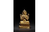 A GILT-BRONZE FIGURE OF SEATED BODHISATTVA