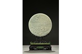 A WHITE JADE CIRCULAR TABLE SCREEN ON ZITAN STAND