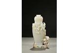 A WHITE JADE CARVED VASE GROUP 