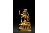 A GILT BRONZE FIGURE OF SEATED MANJUSRI