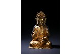 A GILT-BRONZE FIGURE OF BODHISATTVA
