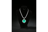 A NATURAL EMERALD AND DIAMOND NECKLACE