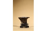 AN AGARWOOD CARVED LIBATION CUP