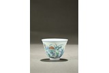 A DOUCAI 'LOTUS POND' WINE CUP