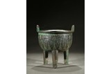A BRONZE 'MYTHICAL PHOENIX' TRIPOD VESSEL