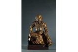 A GILT-BRONZE FIGURE OF GUANDI