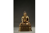 A MONGOLIAN GILT-BRONZE FIGURE OF BUDDHA