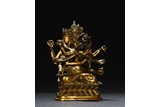 A GILT BRONZE FIGURE OF GUHYASAMAJA