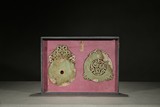 A SET OF TWO ARCHAIC CELADON JADE DISCS