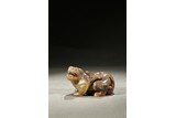 A YELLOW JADE CARVED MYTHICAL BEAST