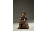 A PARCEL-GILT BRONZE FIGURE OF GUANDI