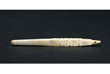 A JADE AWL-SHAPE ORNAMENT